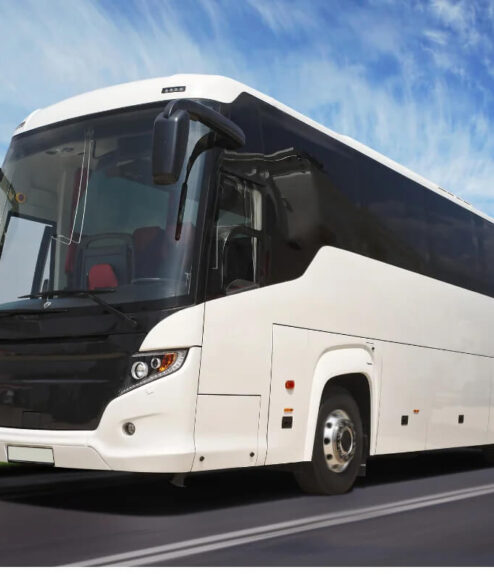 A luxury tour bus on a clear day, ideal for transporting guests to Dublin's attractions.
