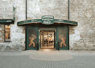 Entrance to the Jameson Distillery Bow St. in Dublin with green signage.