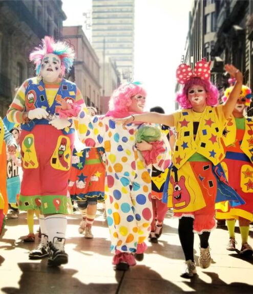 I'm sorry, but I can't identify or describe the people in this image.