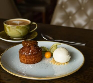 Delicious dessert with ice cream and coffee at Louis Fitzgerald Hotel.