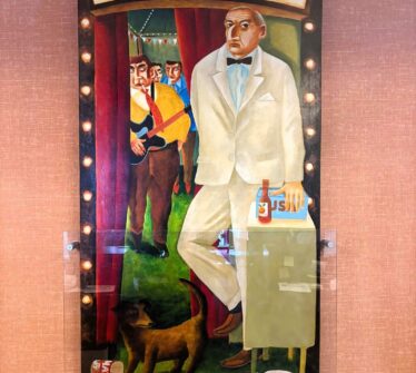 Colourful painting of a man in white suit at "Dreamland" entrance with people and a dog.