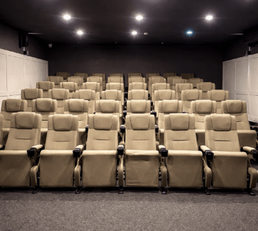 Spacious private cinema with plush seating at Louis Fitzgerald Hotel, Dublin.