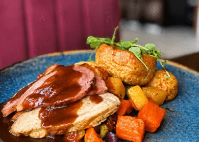 Savoury roast dinner with vegetables at the Louis Fitzgerald Hotel restaurant.