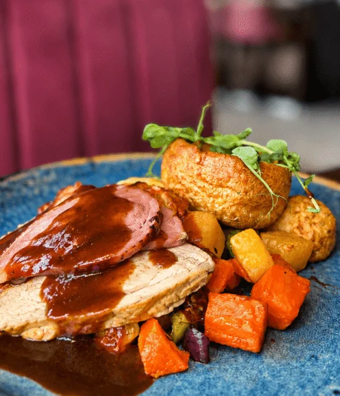 Savoury roast dinner with vegetables at the Louis Fitzgerald Hotel restaurant.